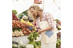 Image Woman shopping vegetables in supermarket.
